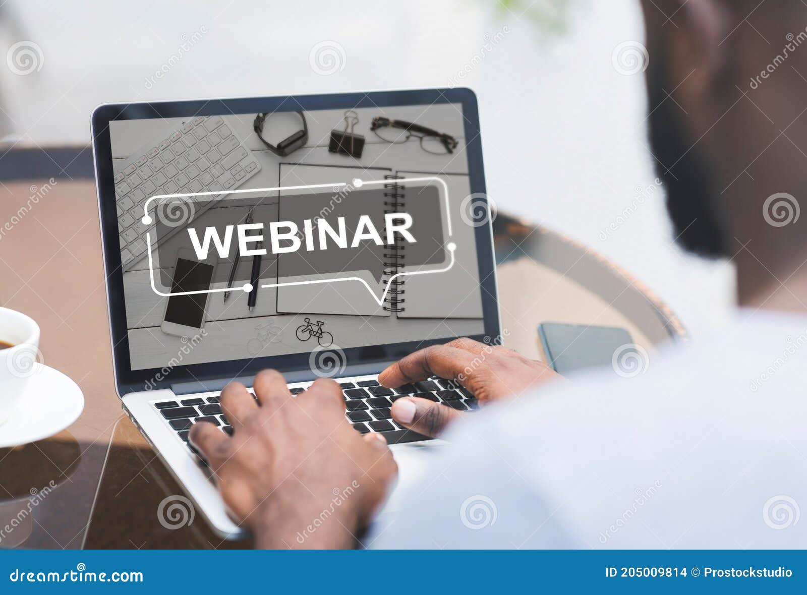 Unrecognizable African American Guy Having Webinar at Cafe Stock Photo
