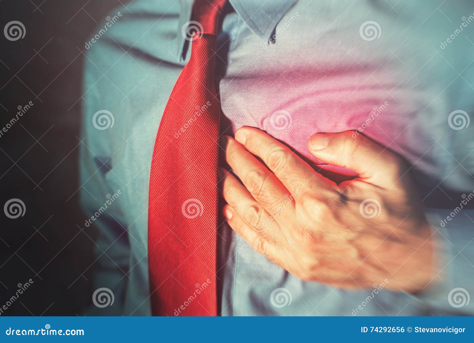 unrecognizable businessman having chest pain and heart attack