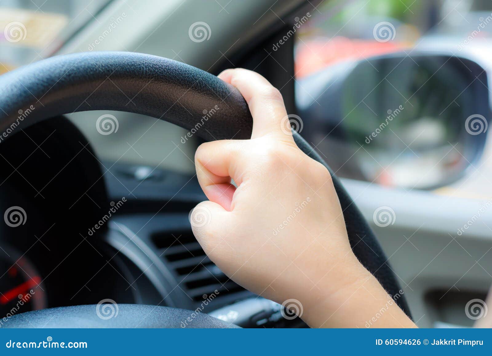 Unsafe Hand on the Steering Wheel during on Driving Stock Photo Image of distracted, person