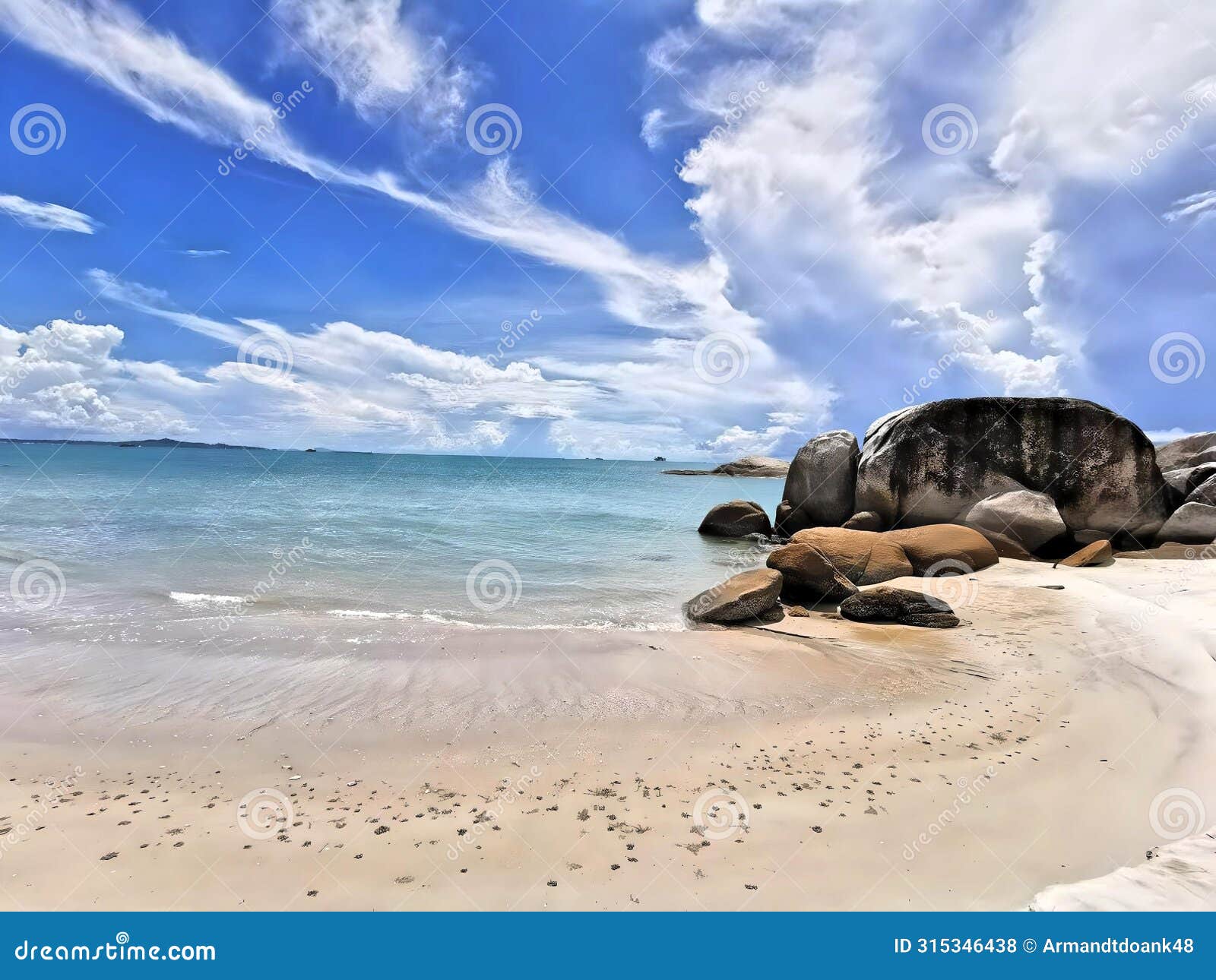 unspoiled beach views with piles of large rocks