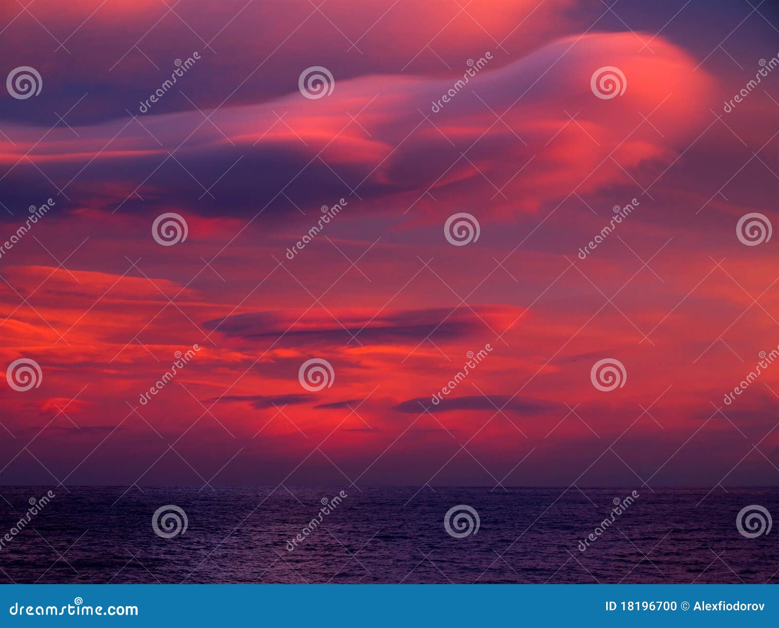 unusual cloud over sea.