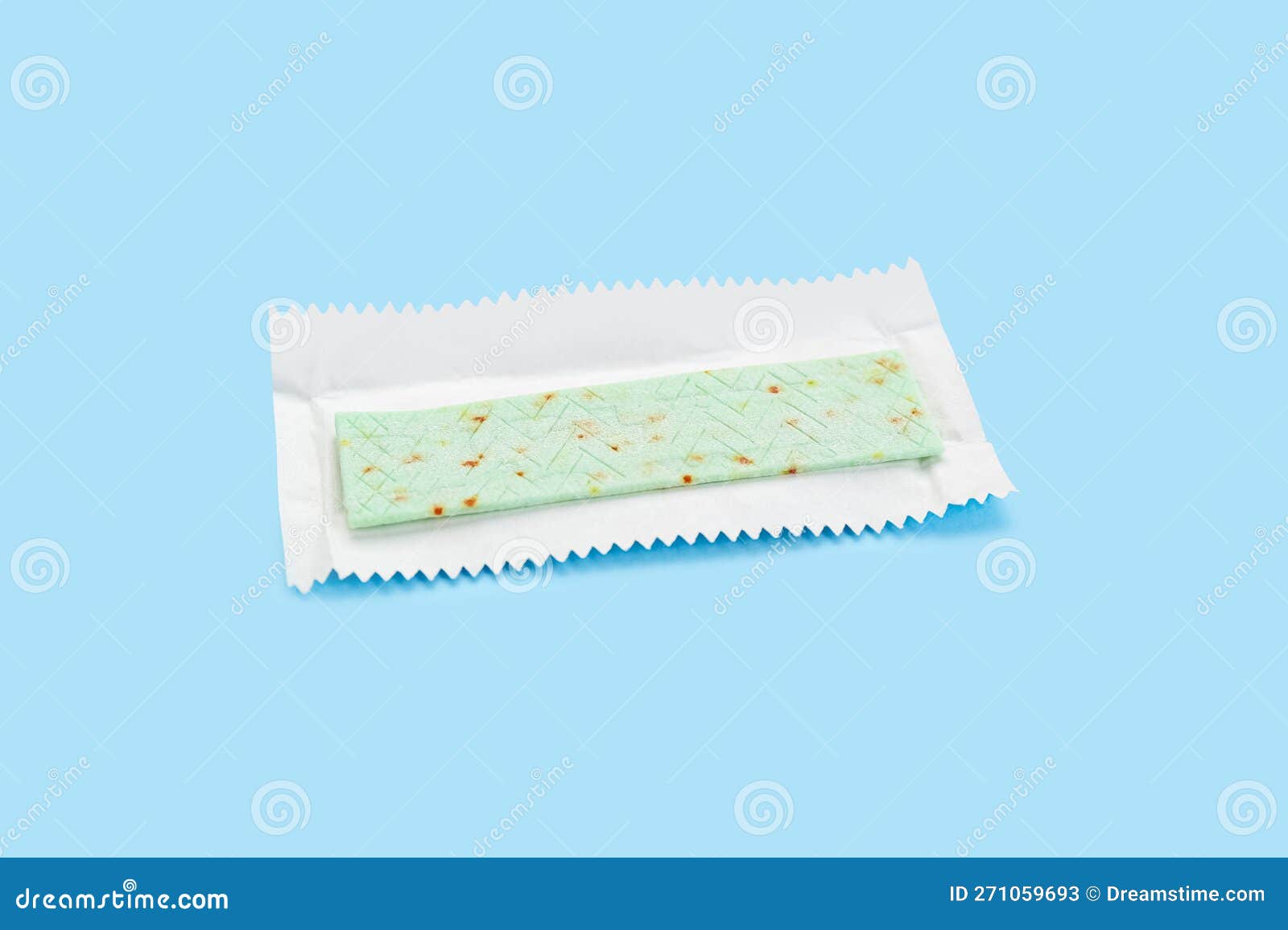 Unwrapped Stick of Chewing Gum on Light Blue Background Stock Image