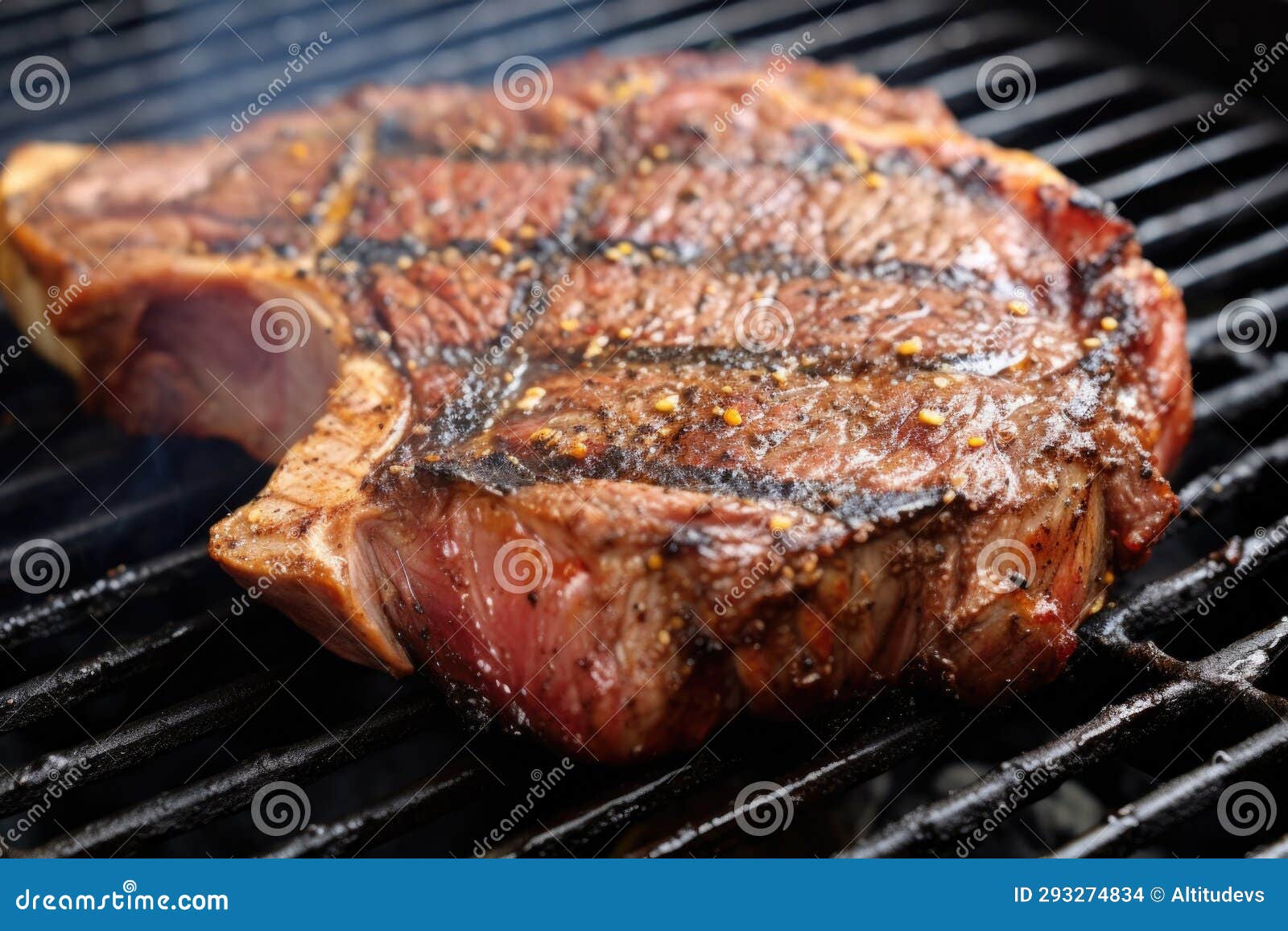 An Upclose View of Seared Grill Marks on Tbone Steak Stock Photo