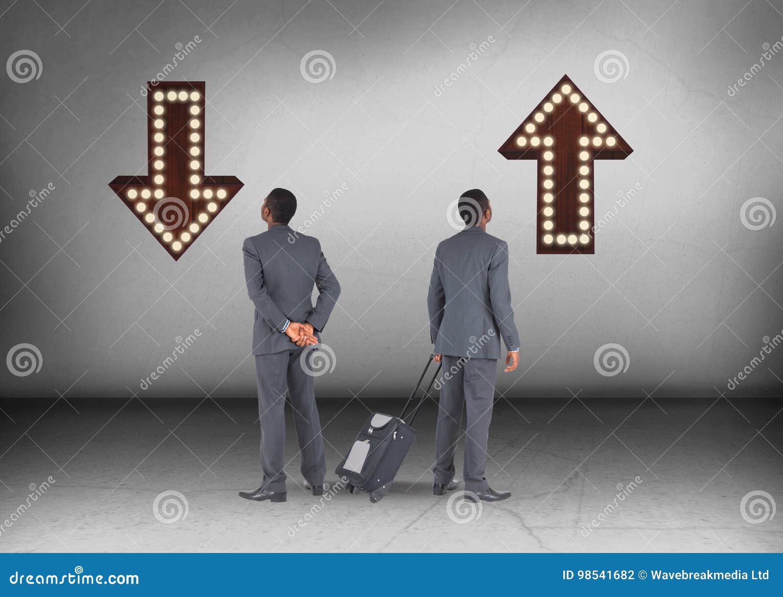 Up or Down Arrows with Businessman Looking in Opposite Directions Stock