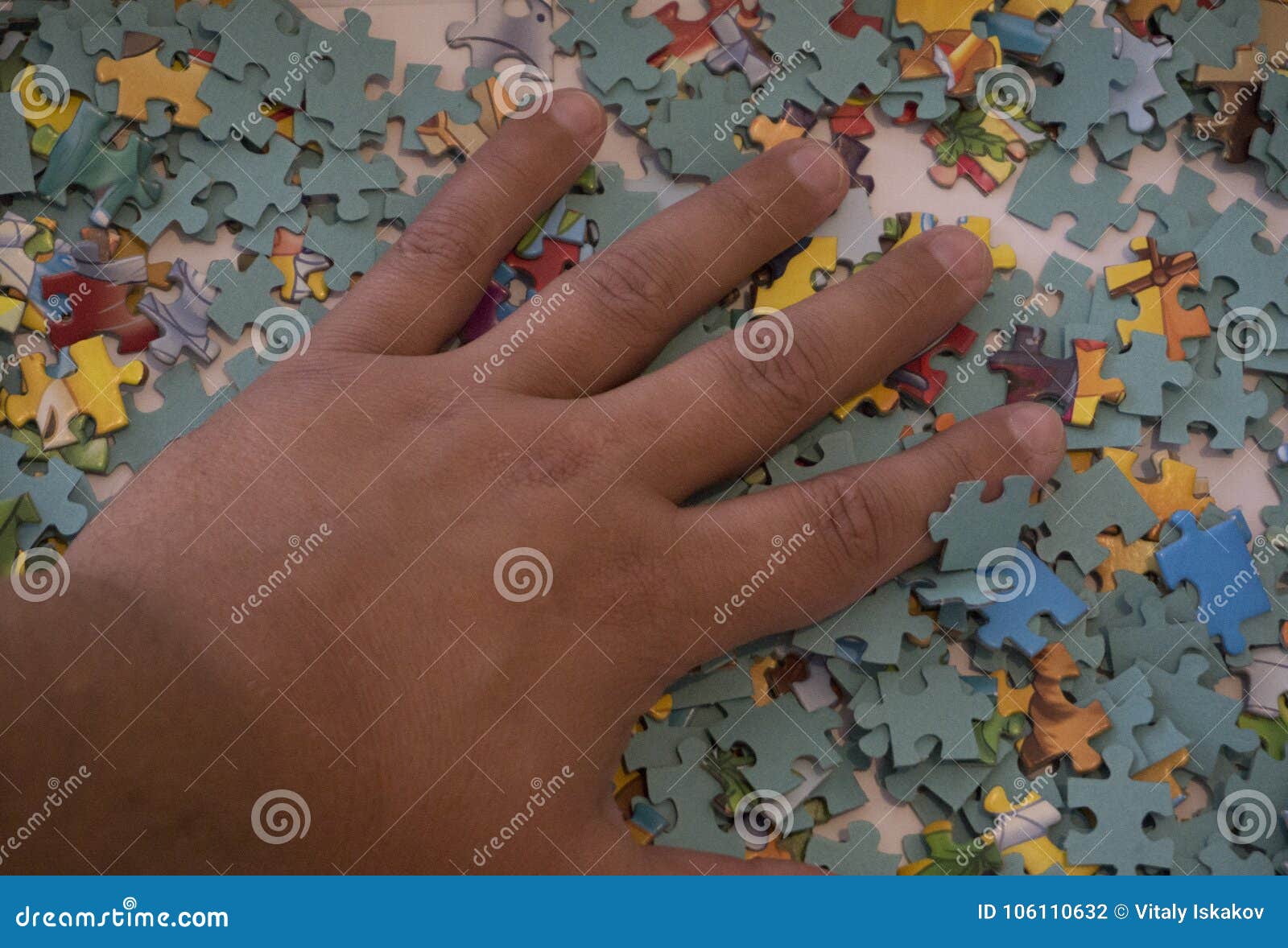 Holding Up The Line For Crossword Clue Up Of Hand Placing The Puzzle , Hand Holding Missing Jigsaw Puzzle