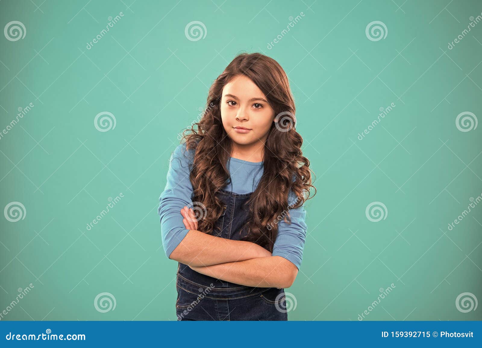 Upbringing Confidence. Kid Girl Long Hair Posing Confidently. Girl Curly  Hairstyle Feels Confident Stock Image - Image of confidently, curly:  159392715
