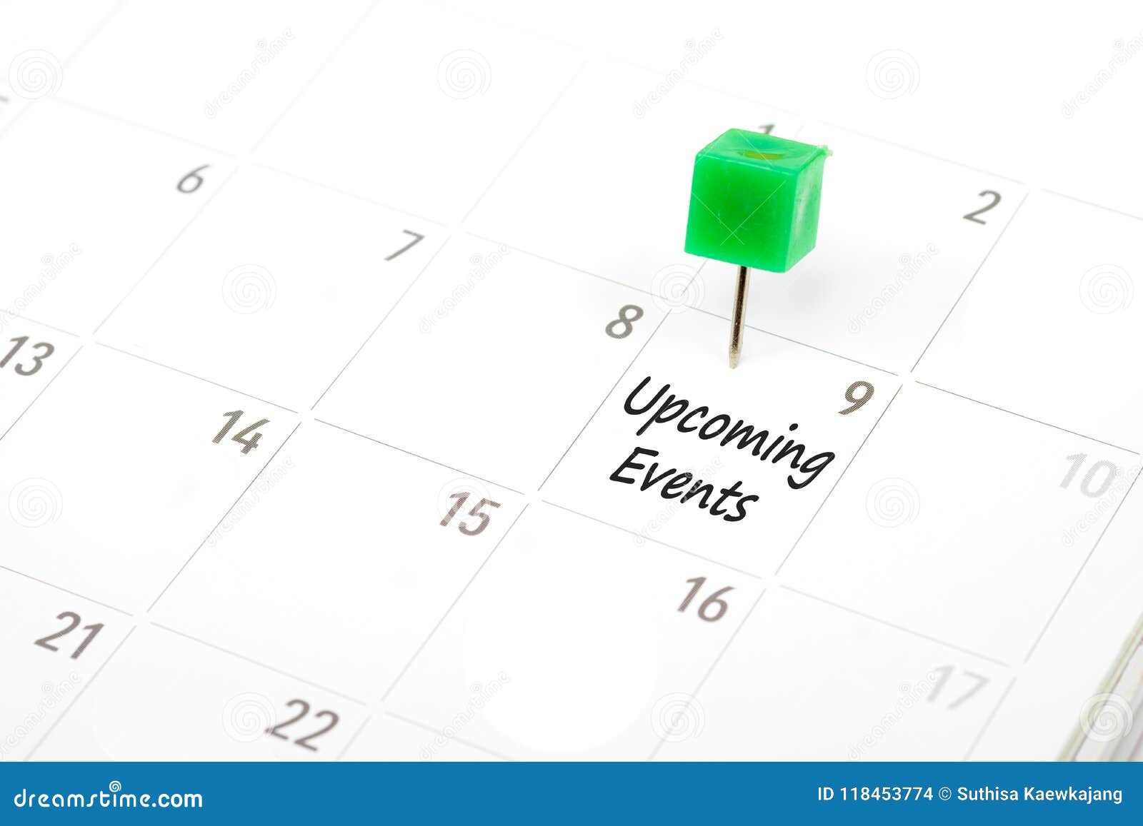 upcoming events written on a calendar with a green push pin to r