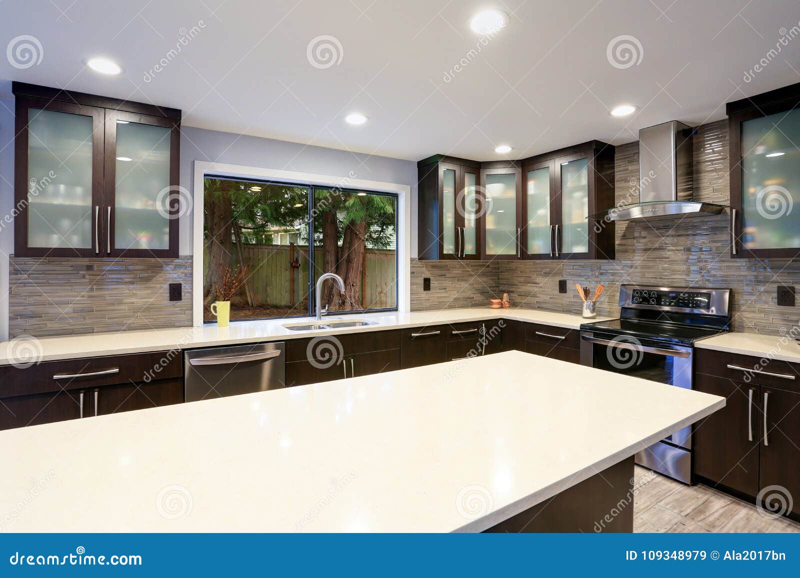 updated contemporary kitchen room interior in white and dark tones.