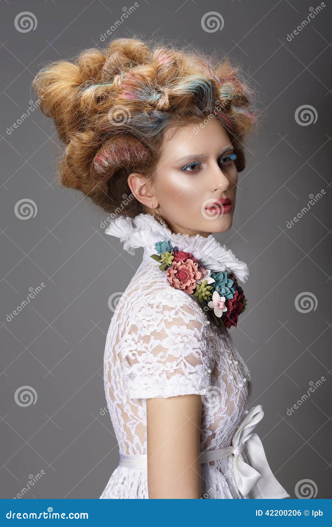 updo. dyed hair. woman with modern hairstyle. high fashion