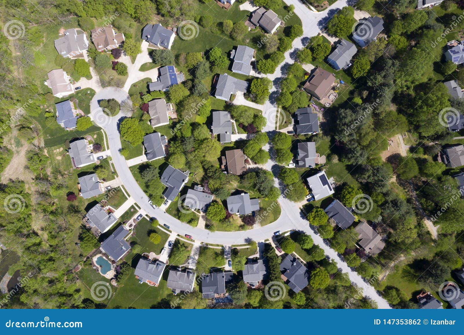 Upper Middle Class American Neighborhood with Curving Street in