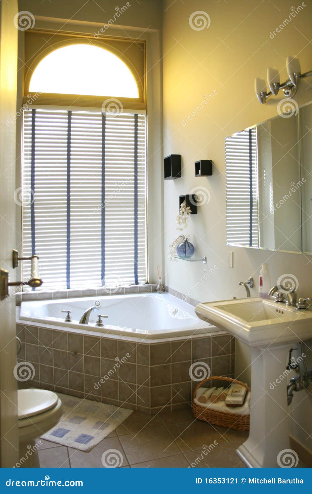 upscale bathroom with corner tub.