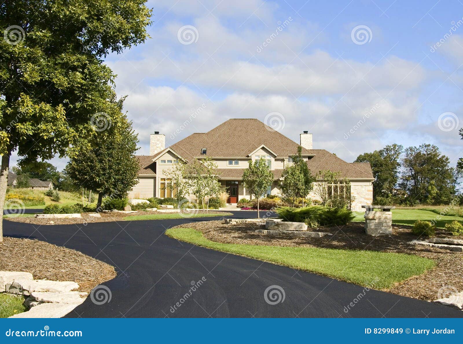 upscale home new paved driveway