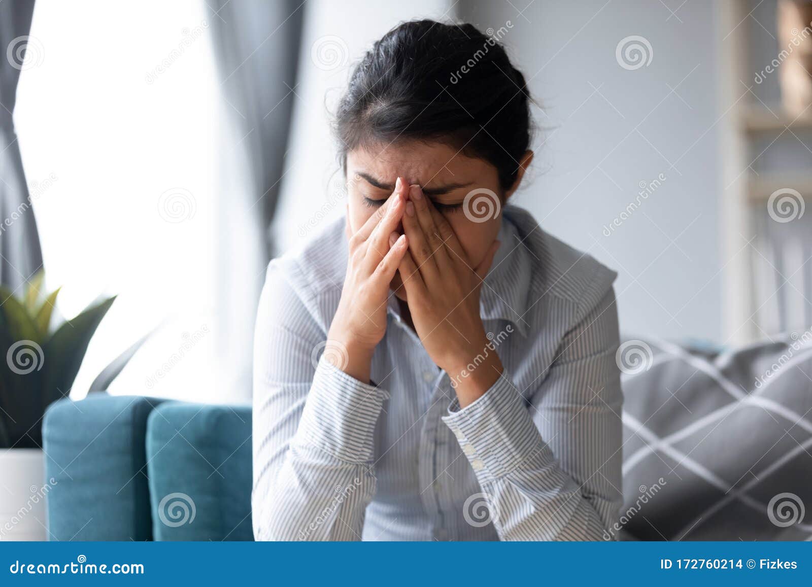 upset indian woman suffer from emotional breakdown