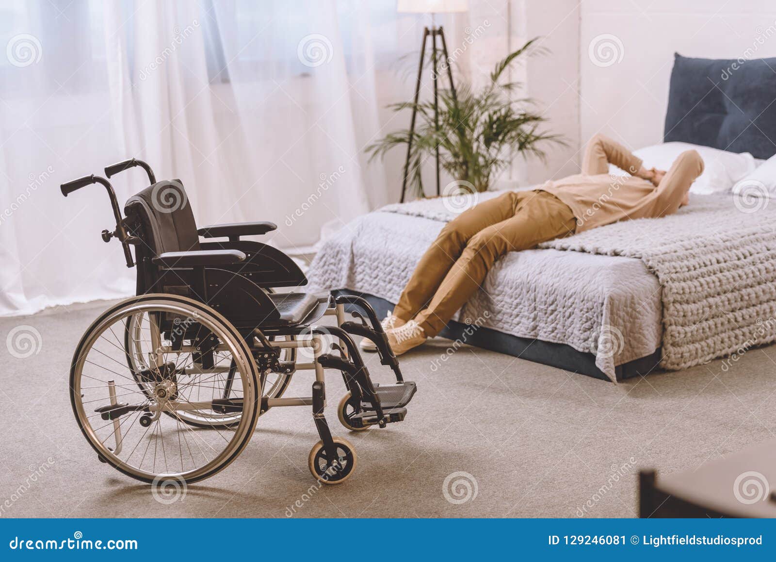 Upset Man with Disability Lying on Bed Stock Image Image of apartment, sadness 129246081