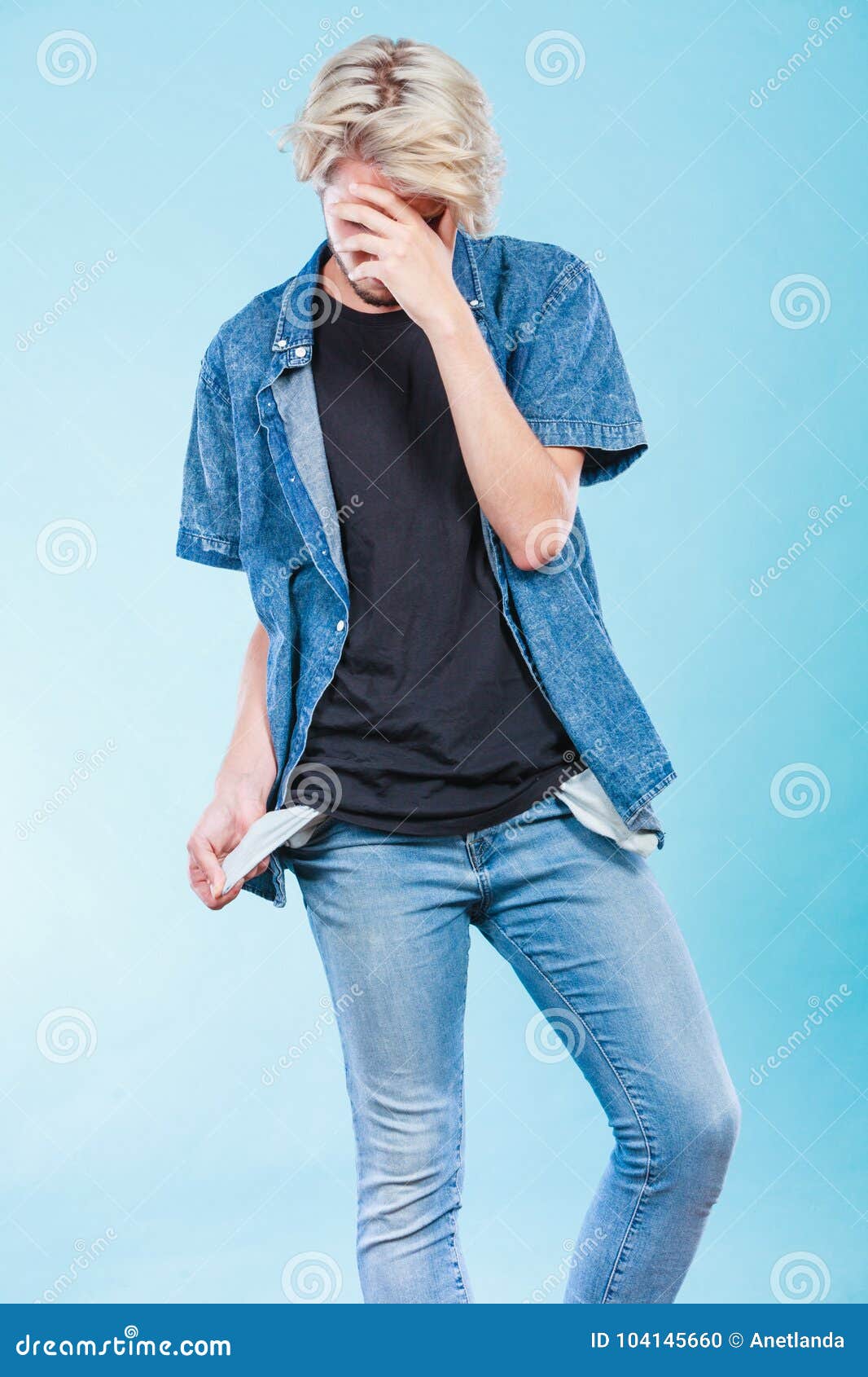 Upset Sad Man Showing Empty Pockets Stock Photo - Image of young ...