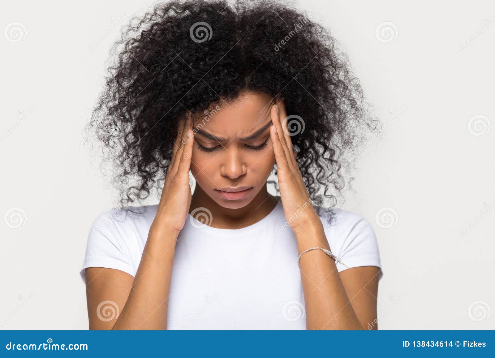 upset stressed black woman massaging temples feeling pain terrible migraine