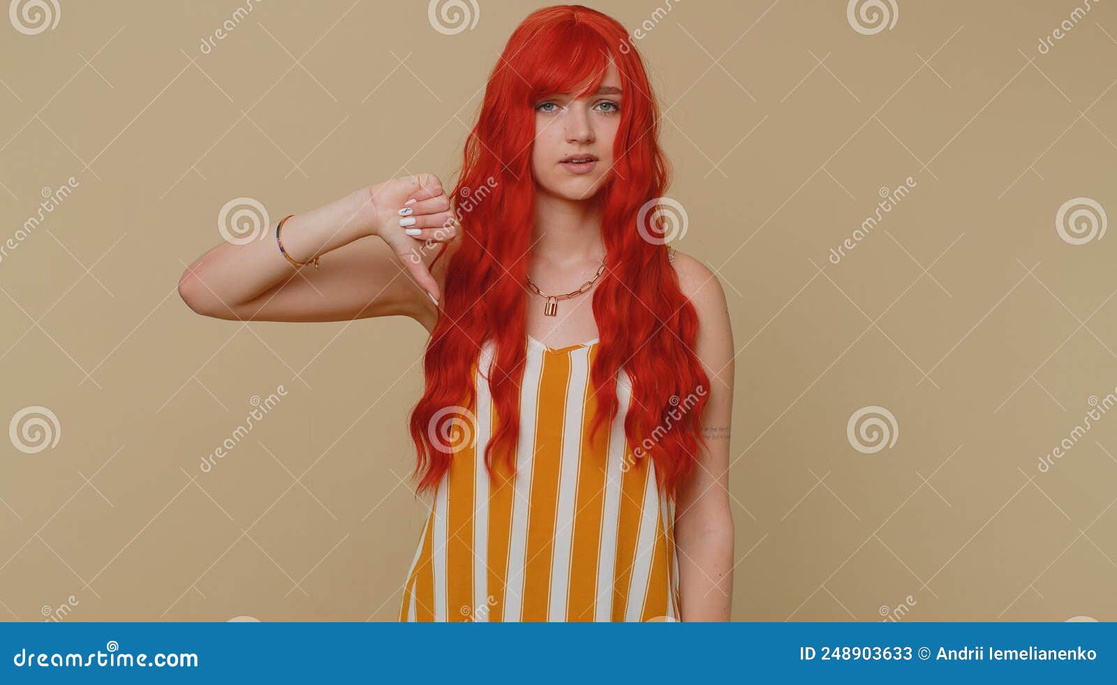 woman taking selfie wearing gray tank top by Ginger Girl. Photo stock -  StudioNow