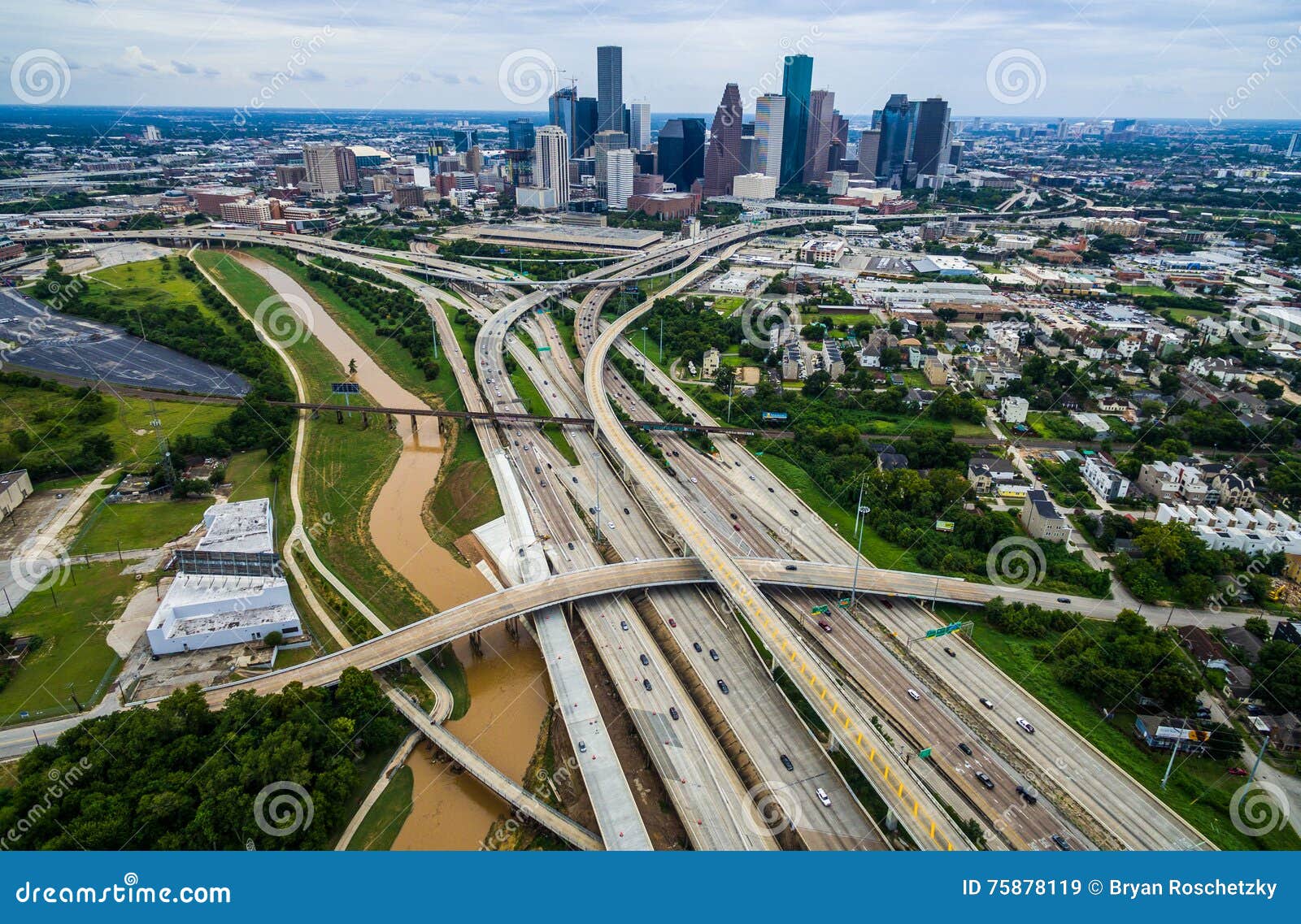 urban sprawl bridge and overpasses high aerial drone view over houston texas urban highway view