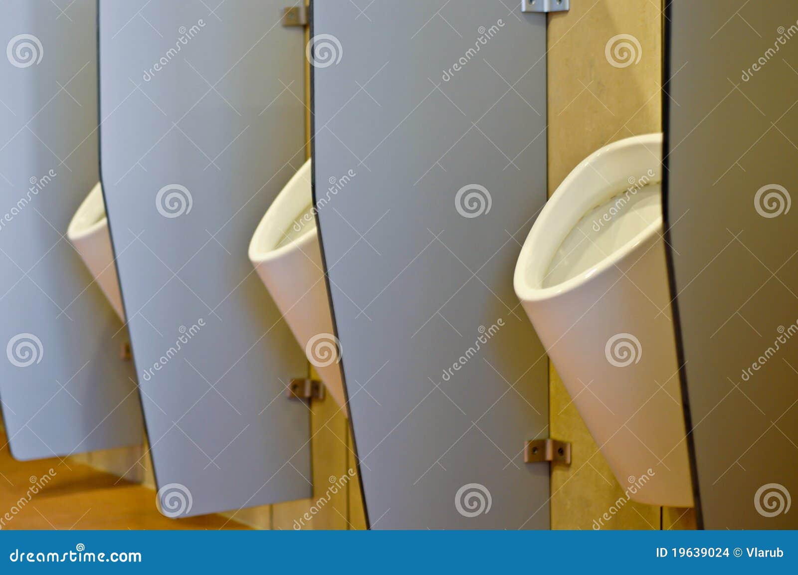 urinals behind partitions