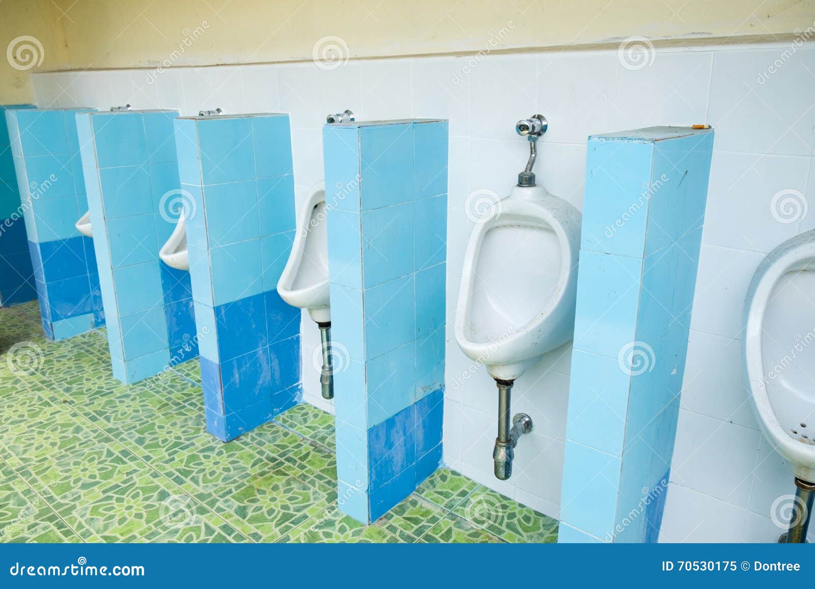 Urinals In Building For Men Only, Closeup Row Of Indoor White Ceramic