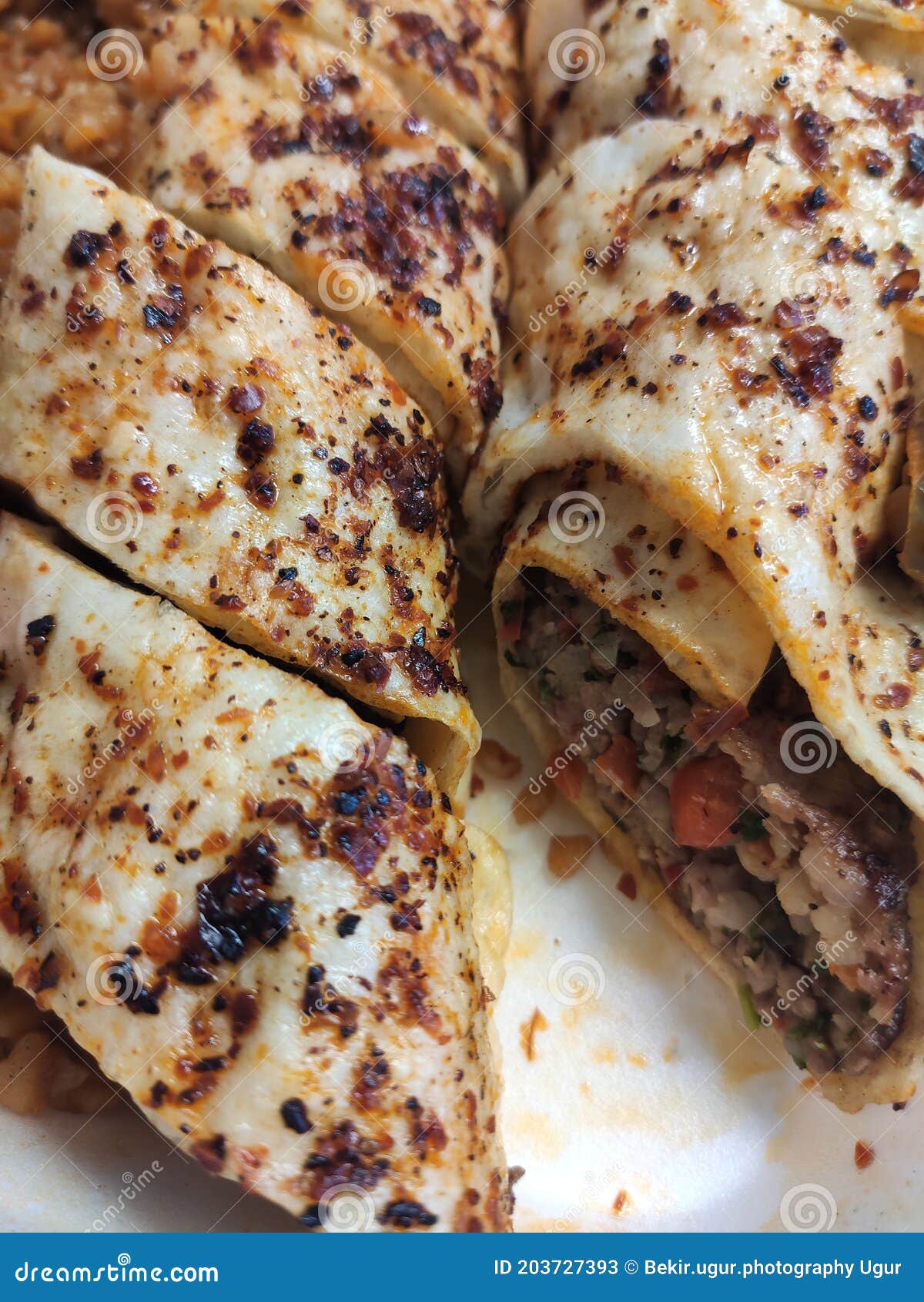 Urkish Beyti Kebab Served with Bulgur Pilaf and Yoghurt. Stock Image