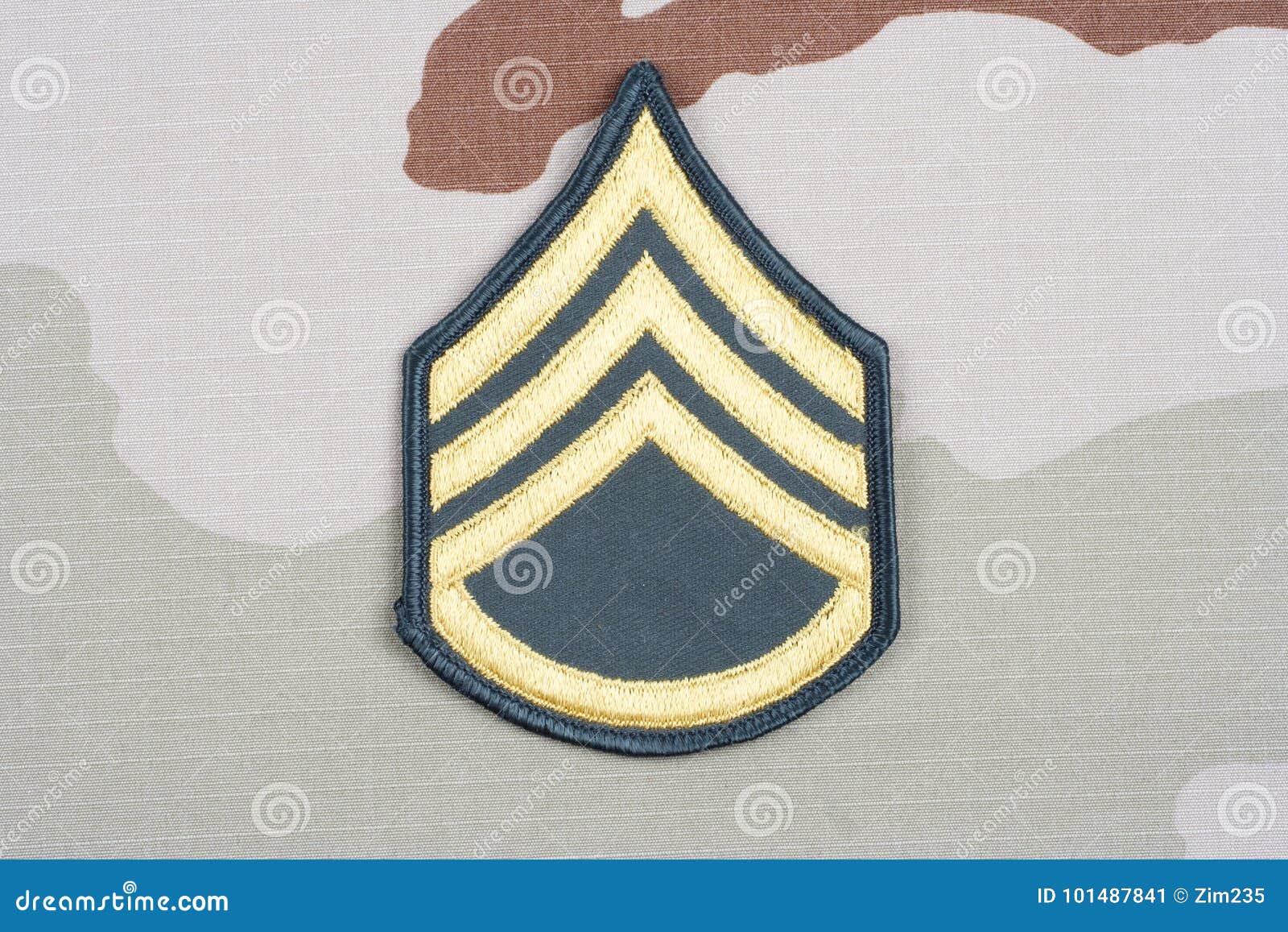 Us army staff sergeant rank patch on desert uniform editorial image