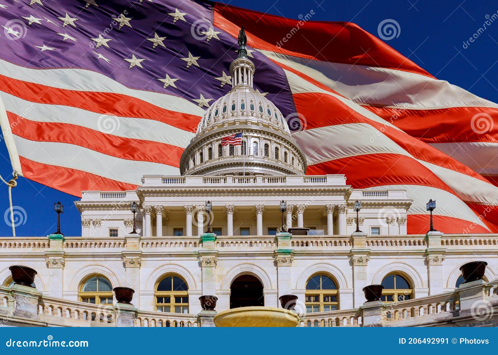 The US Capitol in Washington DC with American Flag Stock Image Image