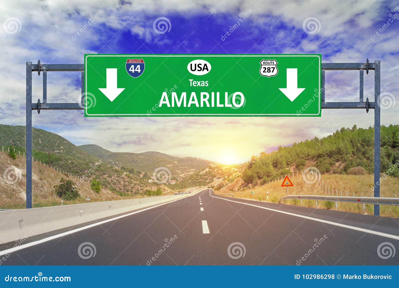 us city amarillo road sign on highway