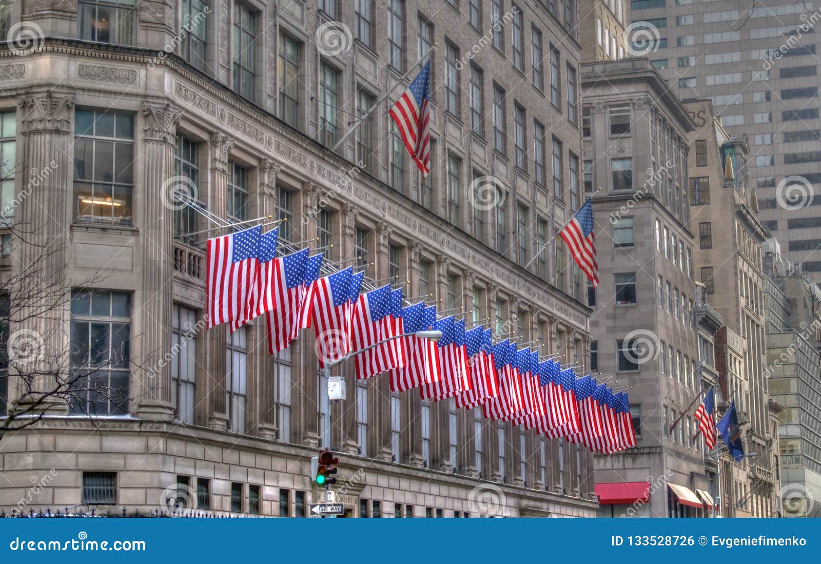 US Flags in a Row on a New York City Building Editorial Photo - Image ...