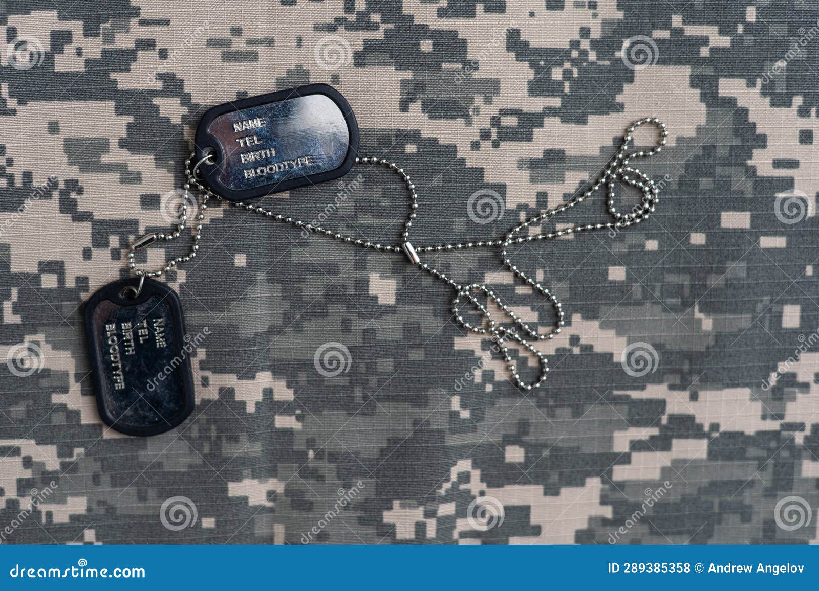 US Military Concept on Olive Green Uniform Background Stock Photo