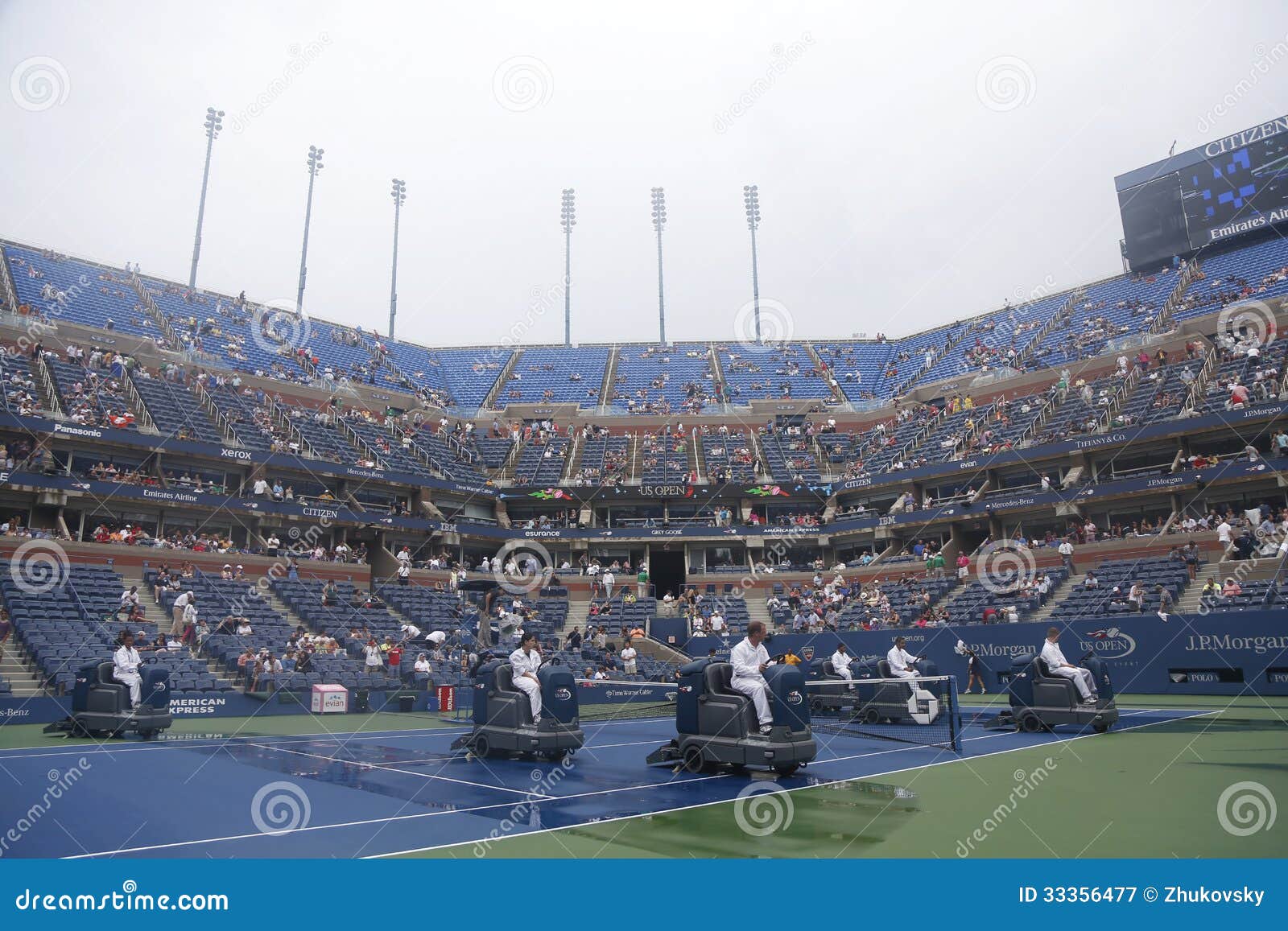 US Open Cleaning Crew Drying Tennis Court after Rain Delay at Arthur Ashe Stadium Editorial Photography