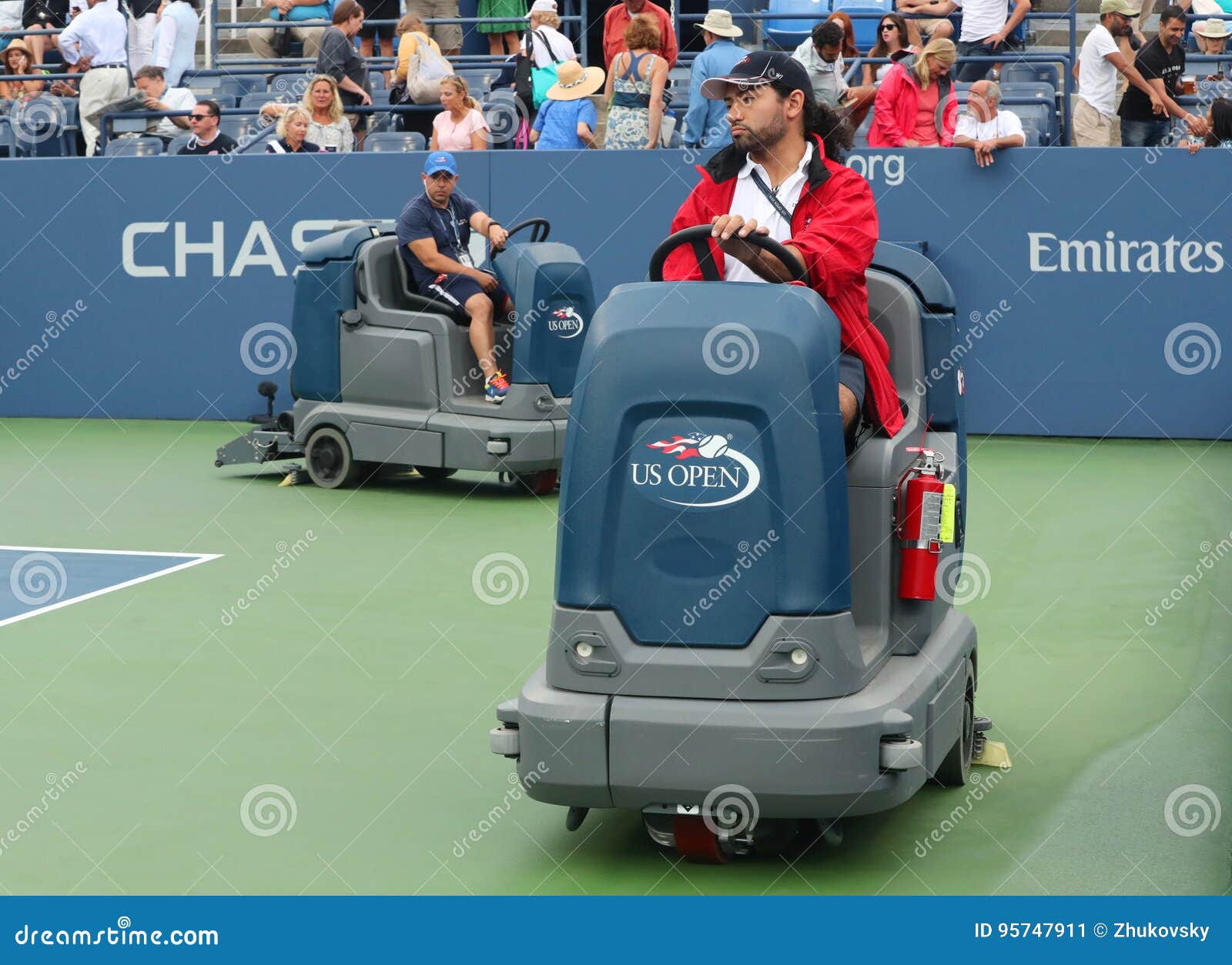 US Open Cleaning Crew Drying Tennis Court after Rain Delay at Louis Armstrong Stadium at Billie Jean King National Tennis Center Editorial Photo