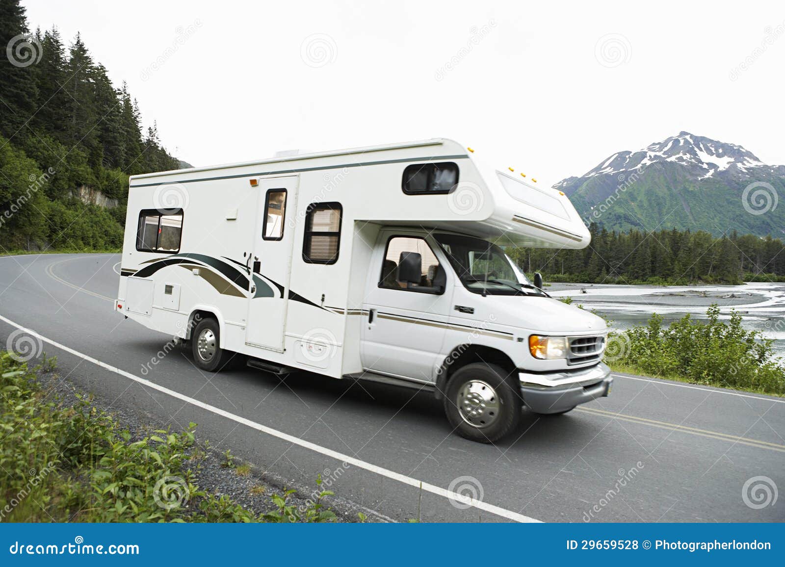 usa, alaska, recreational vehicle driving on road