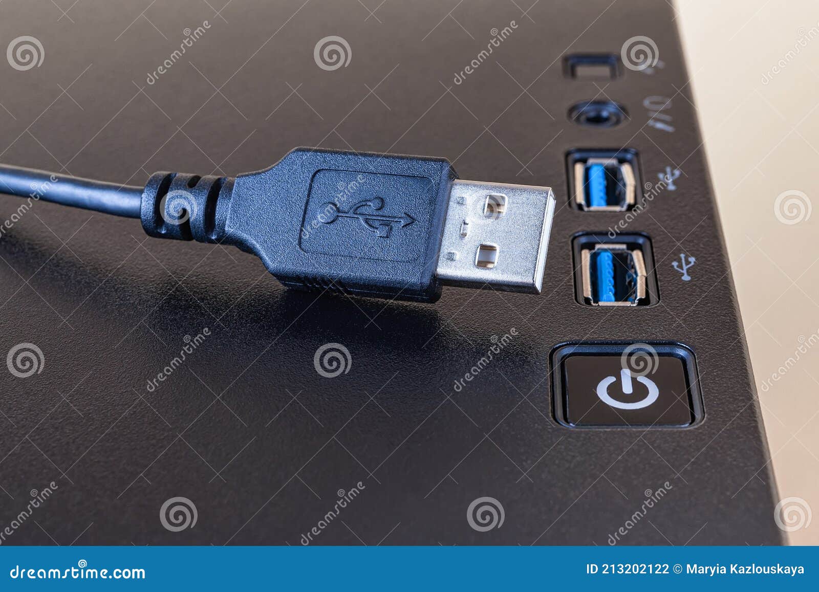 USB Cable Near Two Ports on the Top of a Modern Computer Tower Case