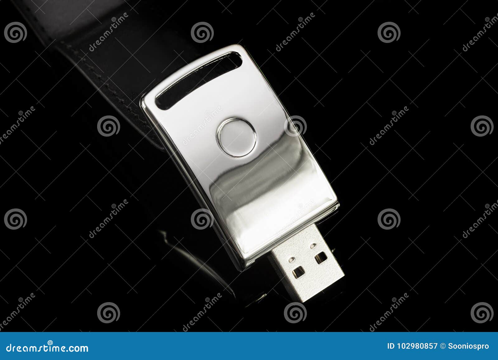 usb metal flash drive on black background. silver color memory s