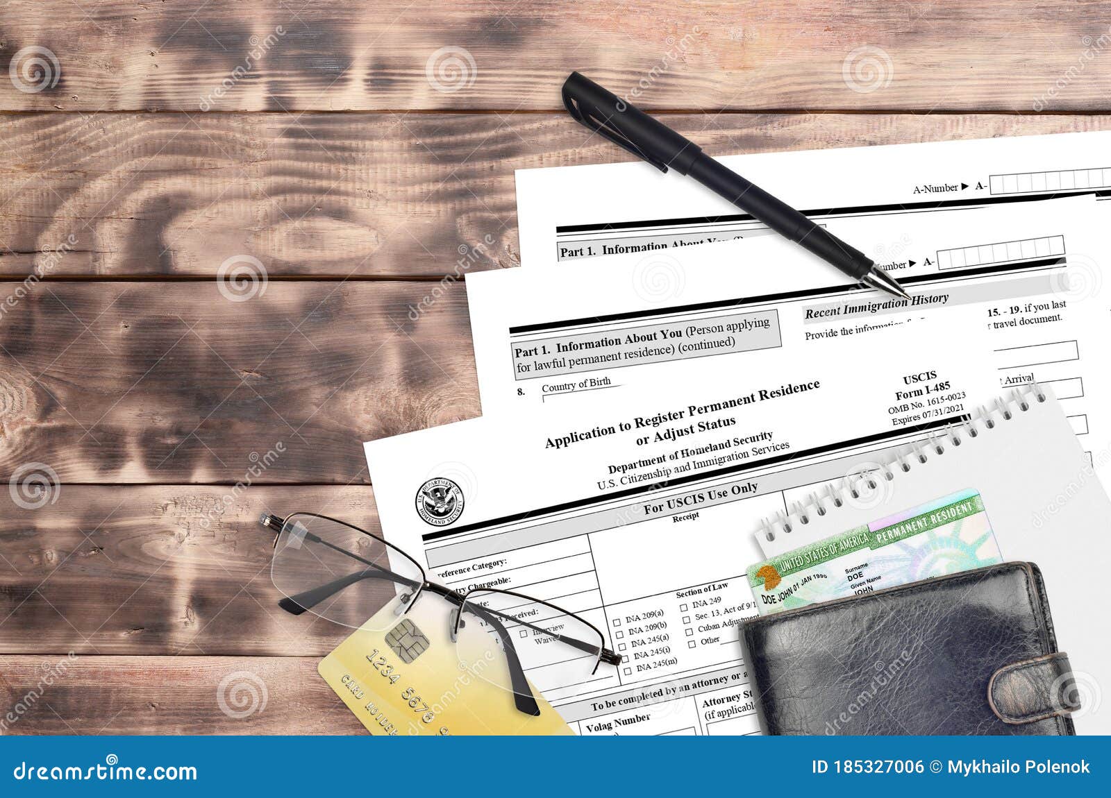 Uscis Form I 485 Application To Register Permanent Residence Or Adjust Status Lies On Flat Lay Office Table And Ready To Fill U S Stock Photo Image Of Instructions Permanent