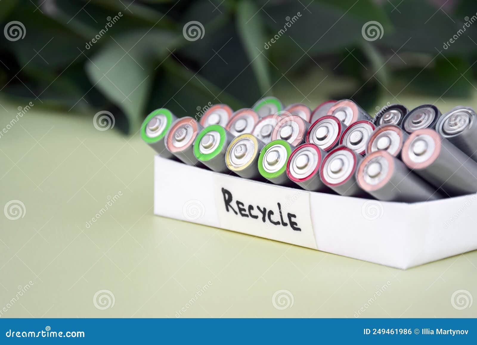 Used AA Batteries and Proper Disposal of Environmentally and Soil Toxic Batteries on a Green