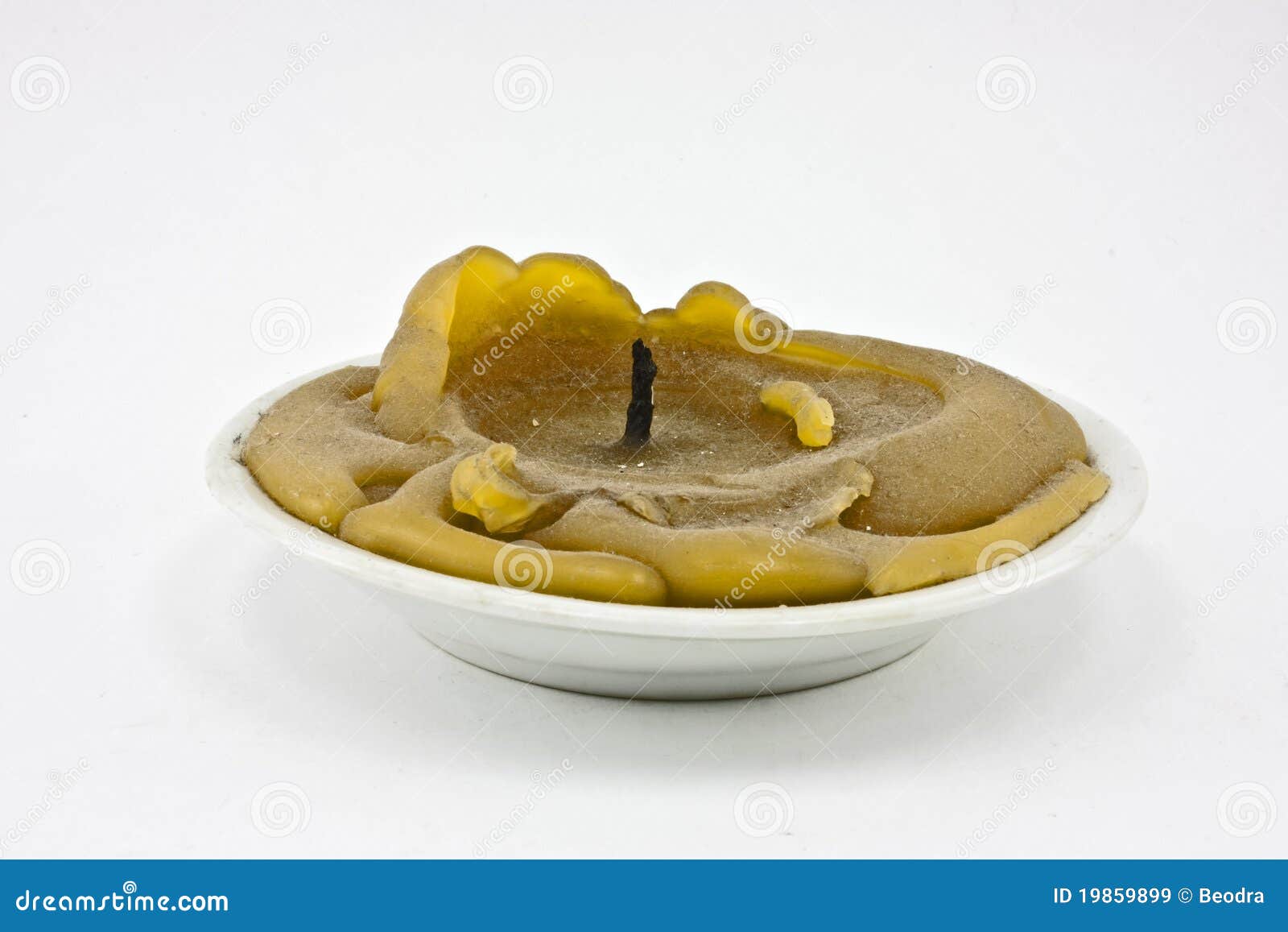 Used candle in saucer stock image. Image of lighting 19859899