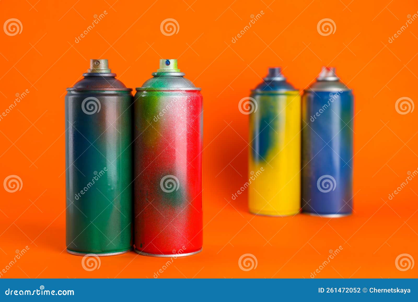 Used Cans of Spray Paints on Orange Background Stock Photo Image of
