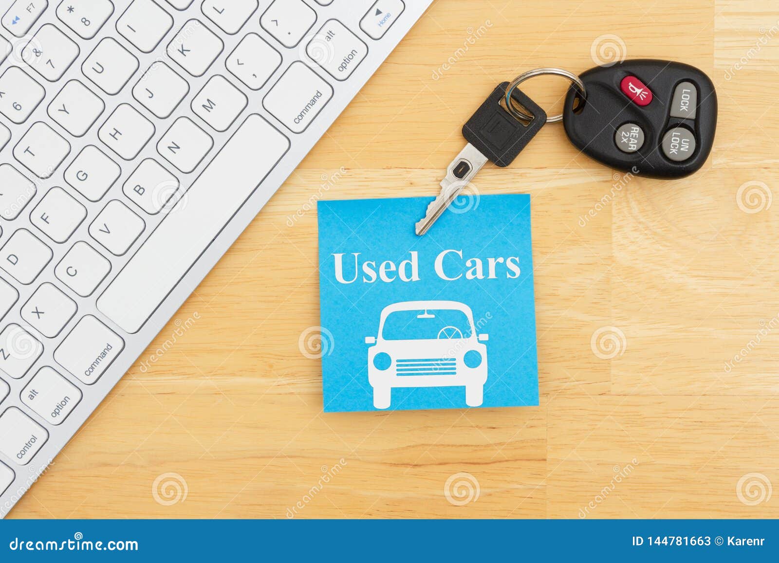 Used Car Message with Car Keys with a Keyboard on a Sticky Note Stock
