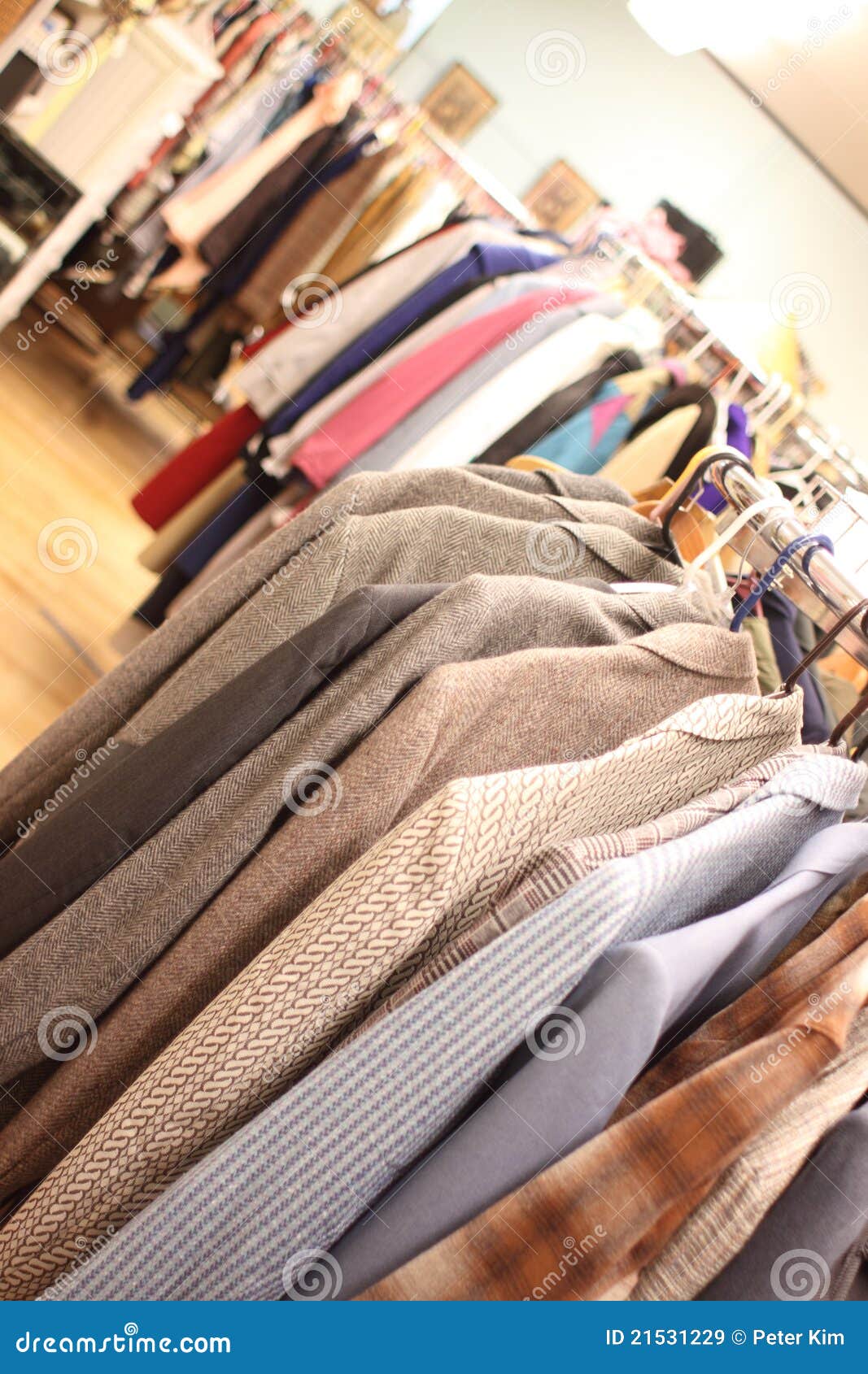 Used clothing. Used coats and jackets in a clothing store.