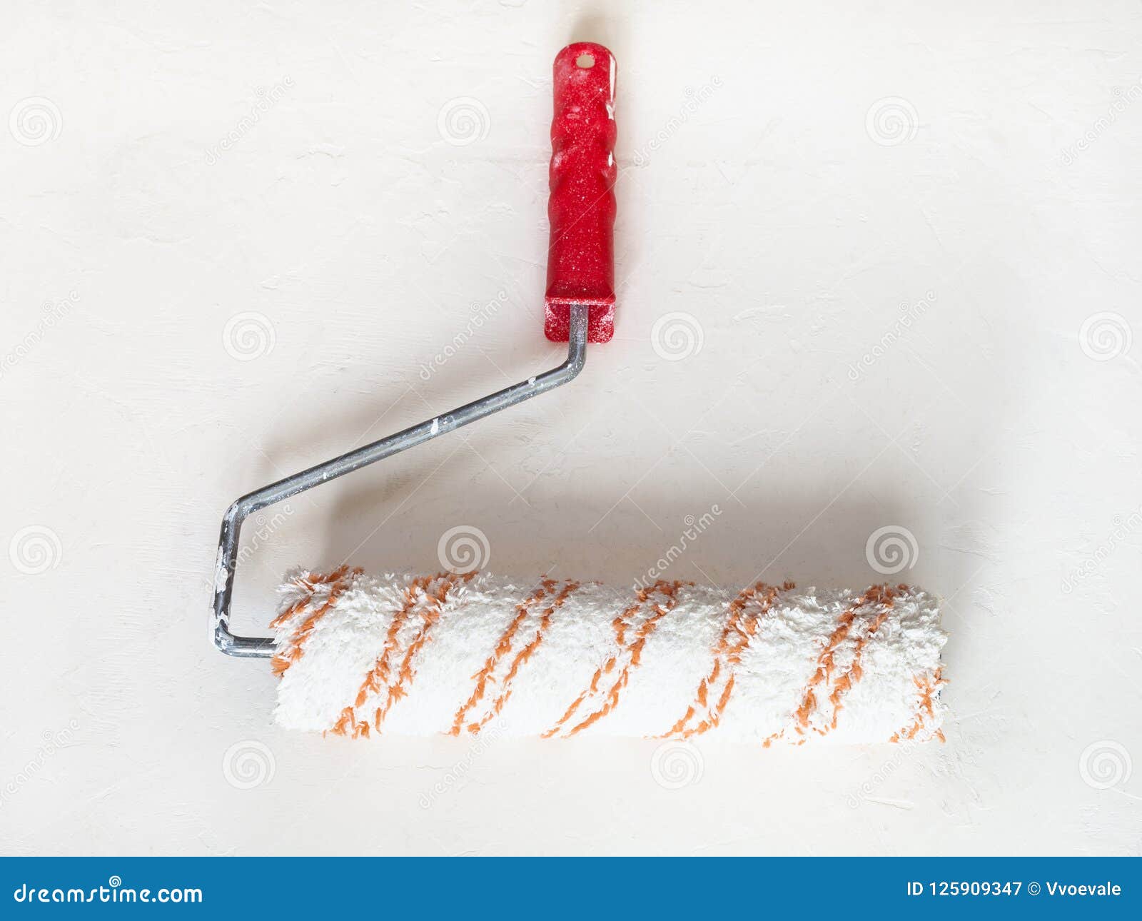 Used Dry Paint Roller On Plastered Surface Stock Image
