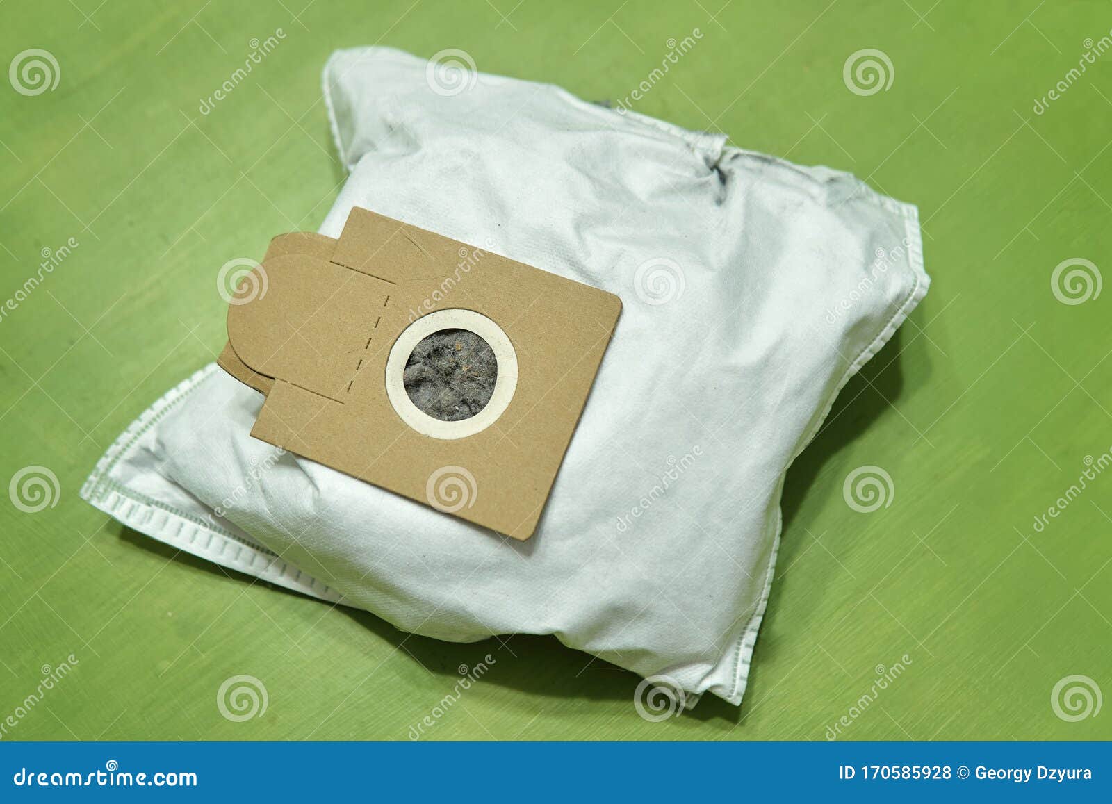 Used Dust Bag Full of a Dirt and Garbage Lying on the Green Surface Close  Up Stock Photo - Image of housekeeping, closeup: 170585928