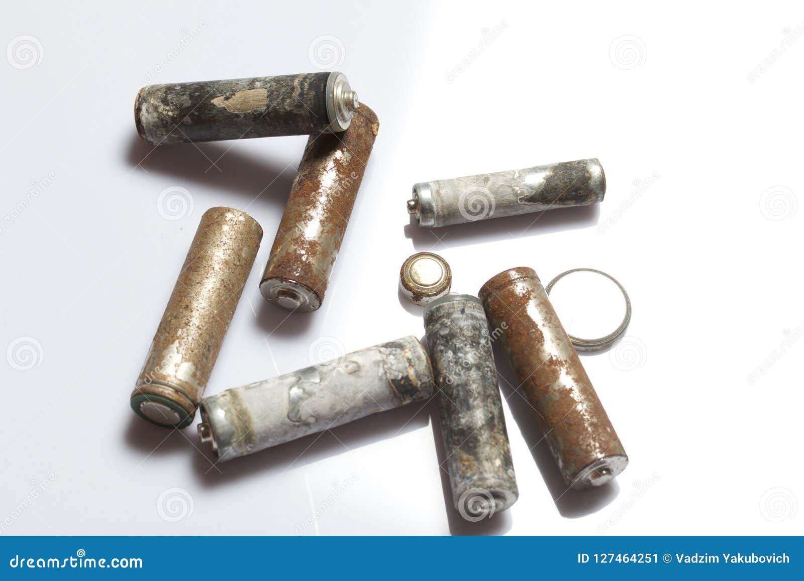 Used Fingerwound Batteries Covered with Corrosion. Recycling. Stock