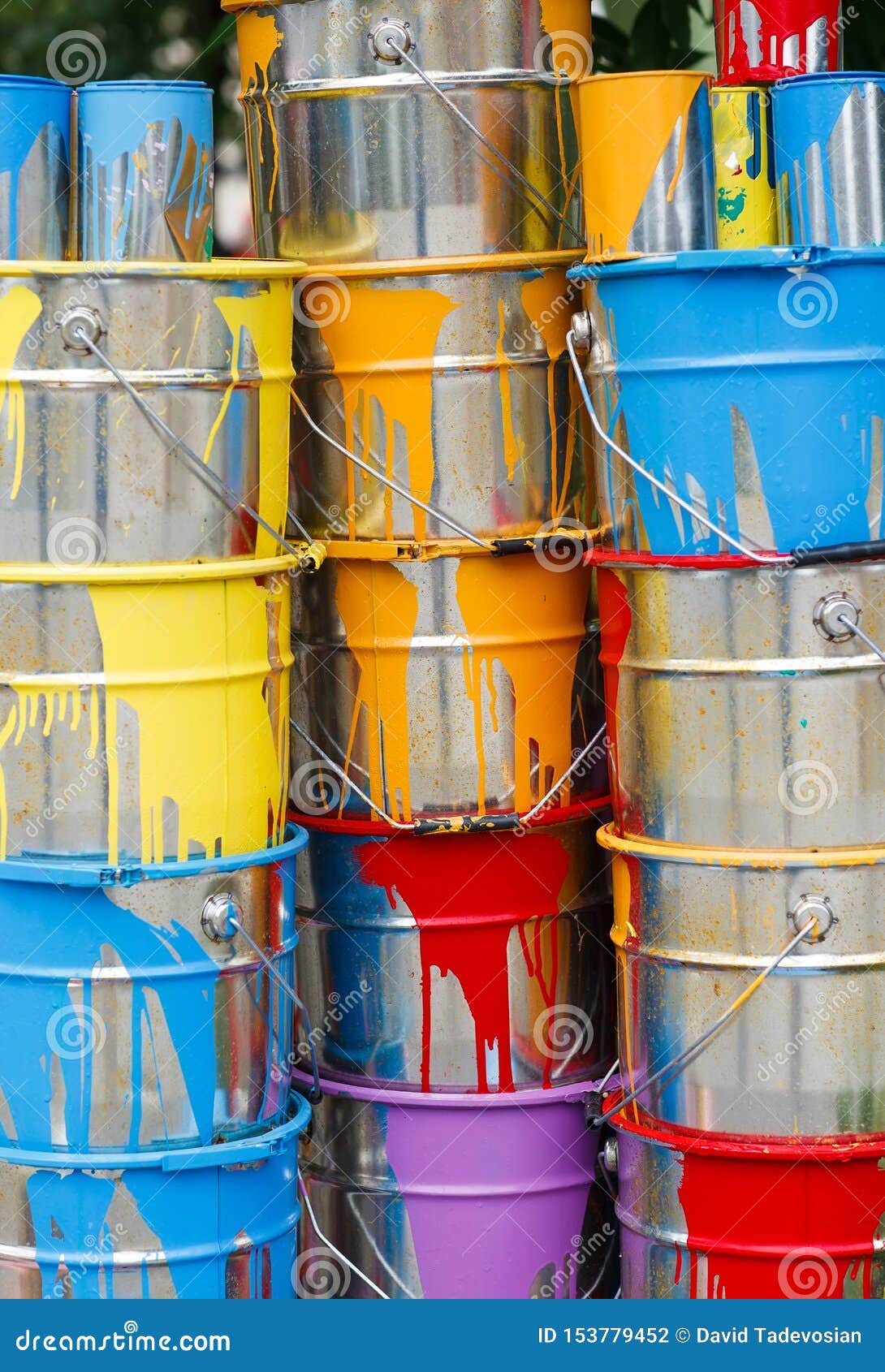 The Used Paint Cans. Colorful Paint Buckets. Stock Photo Image of