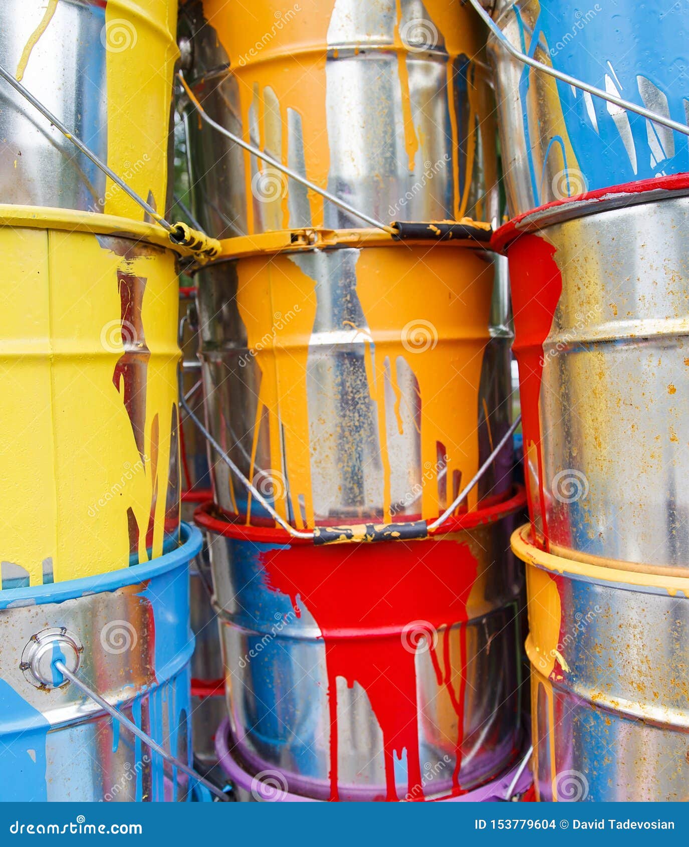 The Used Paint Cans. Colorful Paint Buckets. Stock Photo Image of