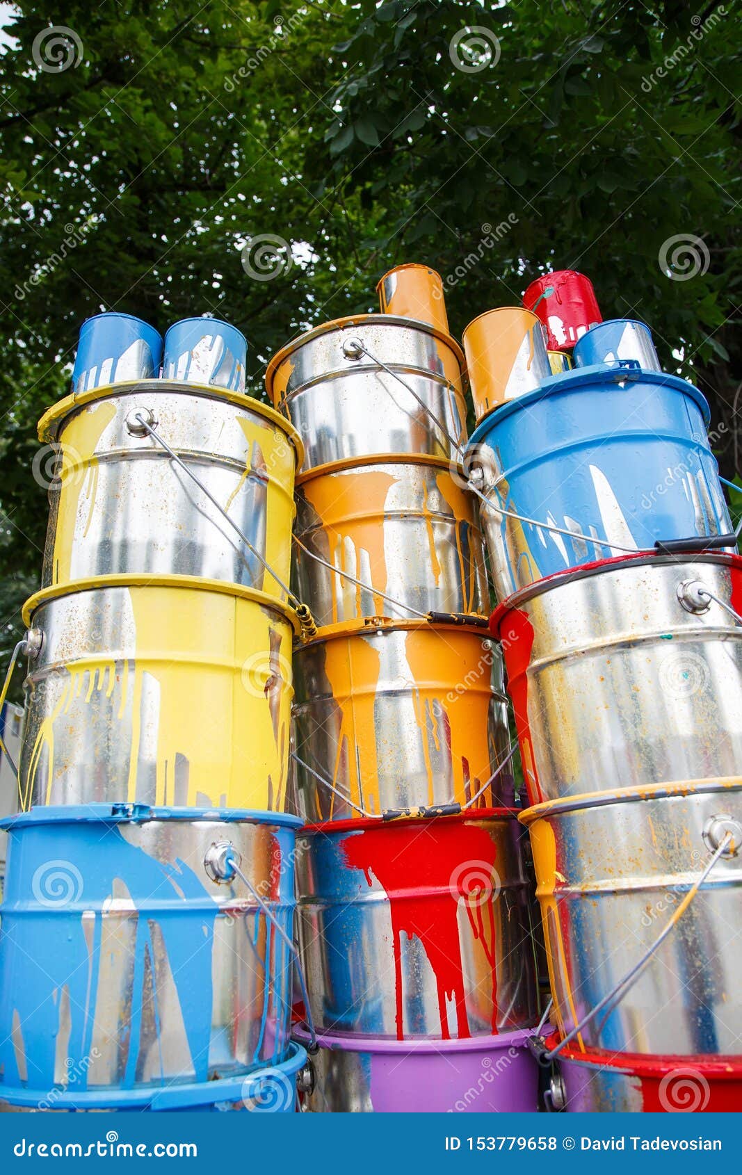 The Used Paint Cans. Colorful Paint Buckets. Stock Photo Image of