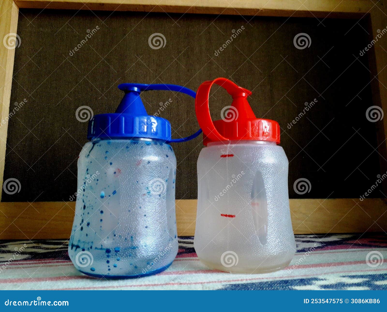 This Used Paint Plastic Bottle on the Table with a Beautiful Ethnic
