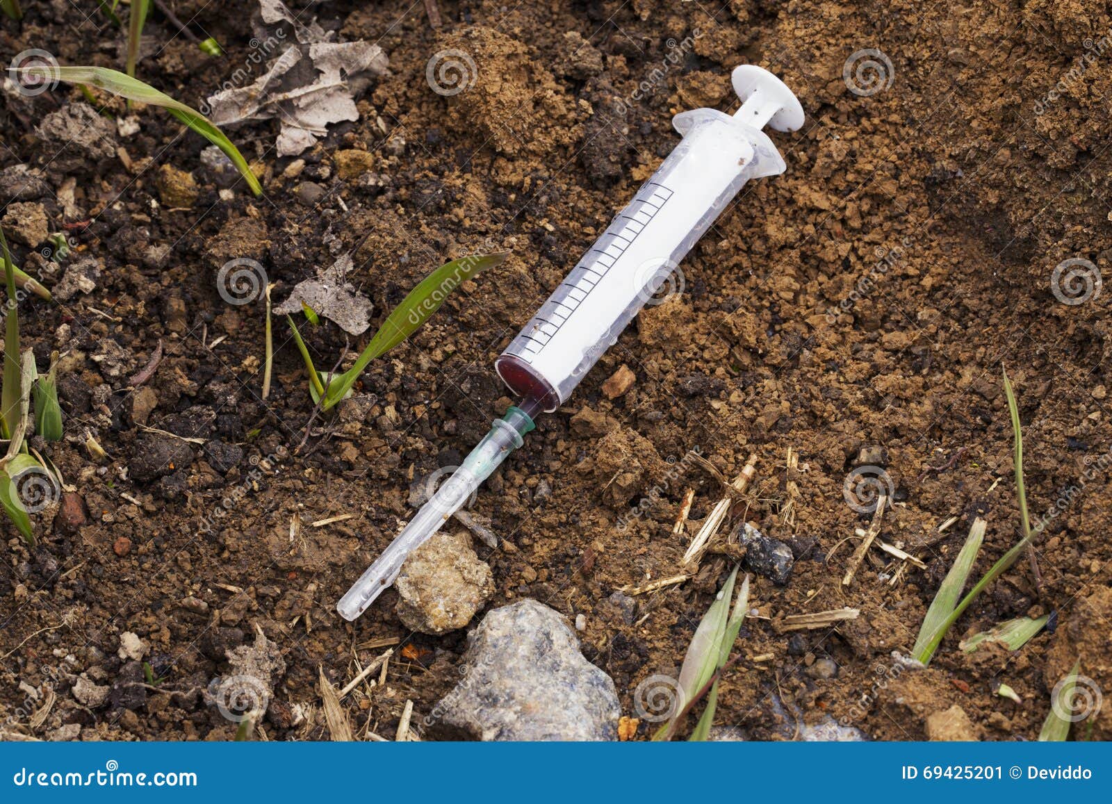 The used syringe stock image. Image of social, drug, ground 69425201