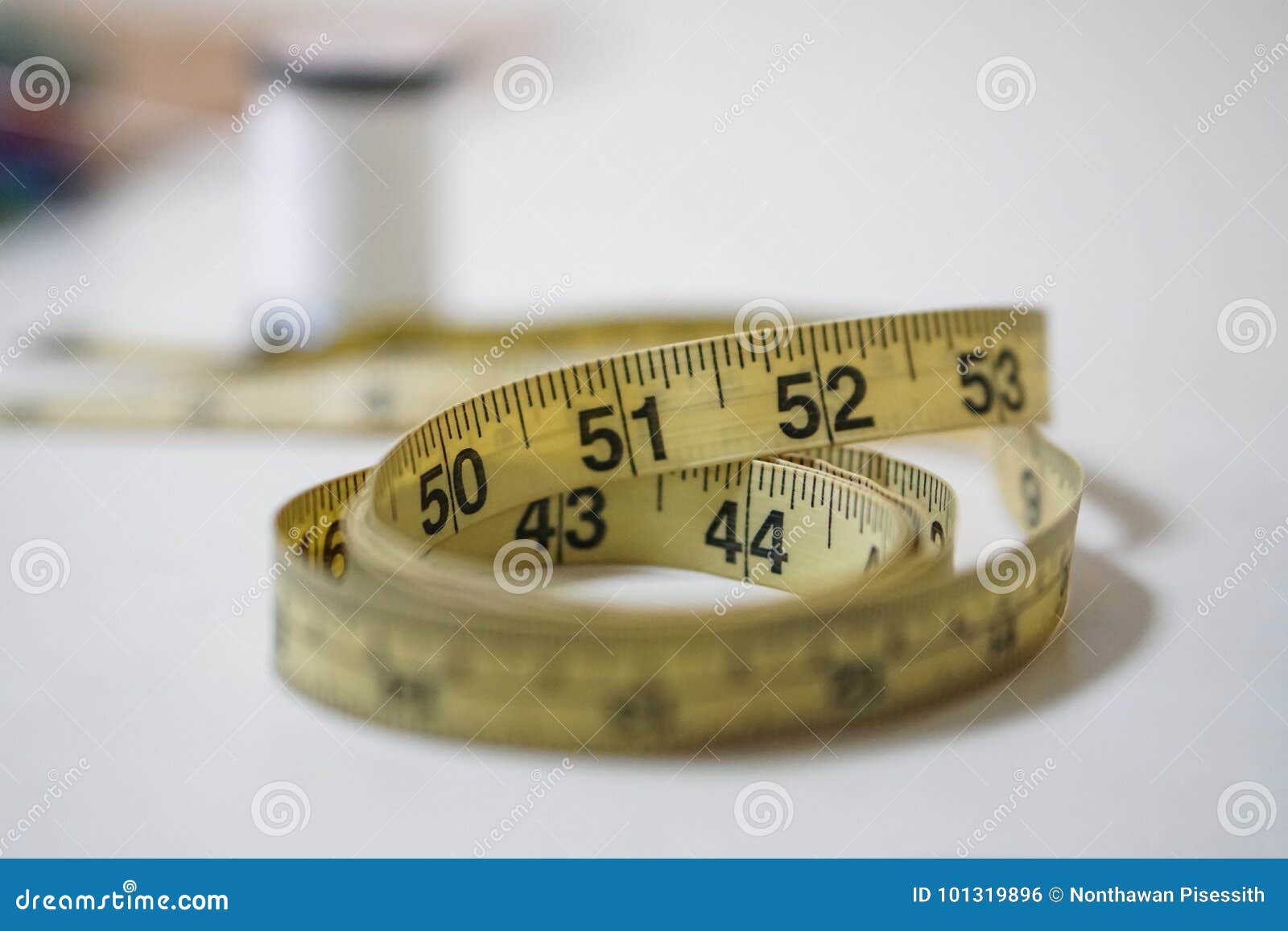 https://thumbs.dreamstime.com/z/used-yellow-soft-tape-measurement-sewing-tailor-ruler-used-yellow-soft-tape-measurement-sewing-tailor-ruler-kit-101319896.jpg